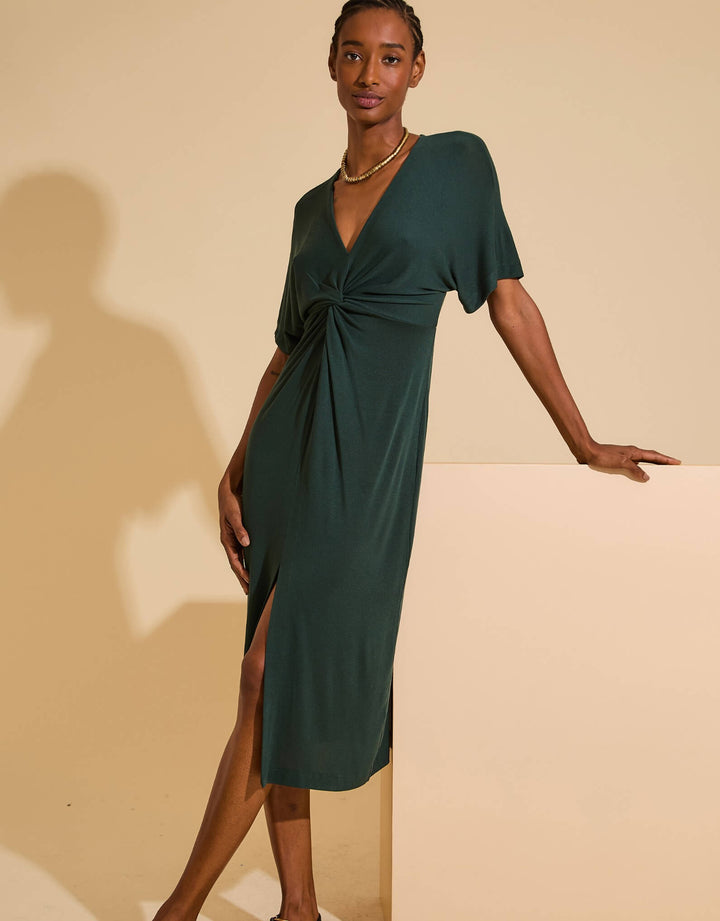 Lenny Niemeyer V-Neck Cover-Up Dress in Pine Green with twist-front waist and front slit, semi-sheer knit, available at Catriona.
