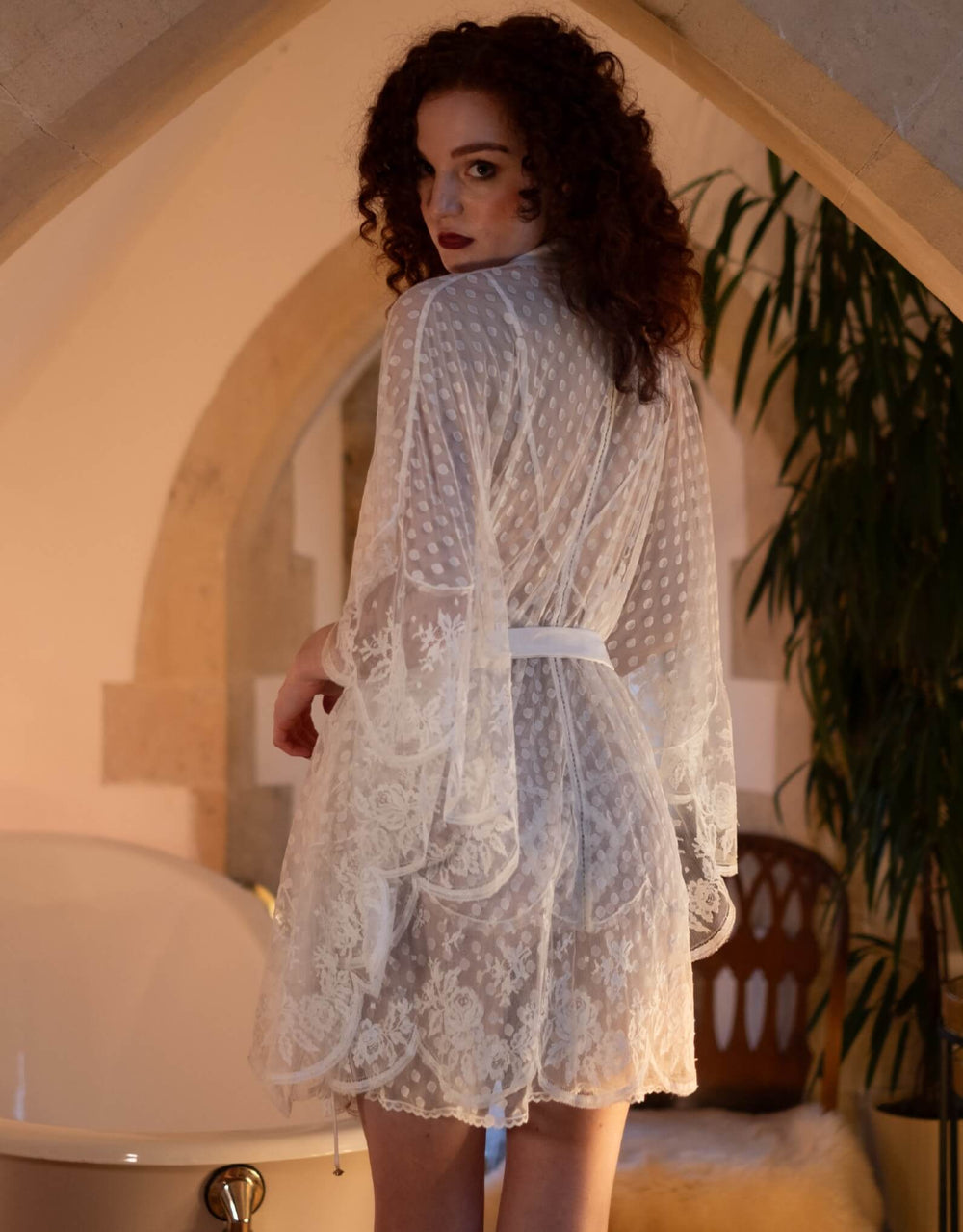 Luxury kimono by Shell Belle Couture featuring butterfly silhouette and lace appliqué
