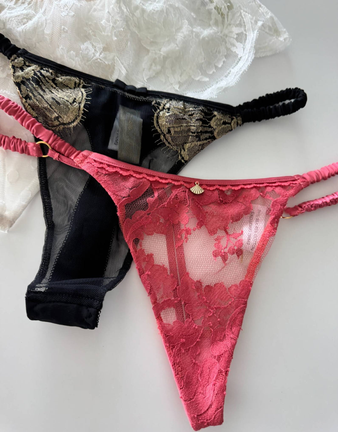 Shell Belle Couture thong in Orange Blossom lace with gold fan trim, silk straps, and bow detail at the back