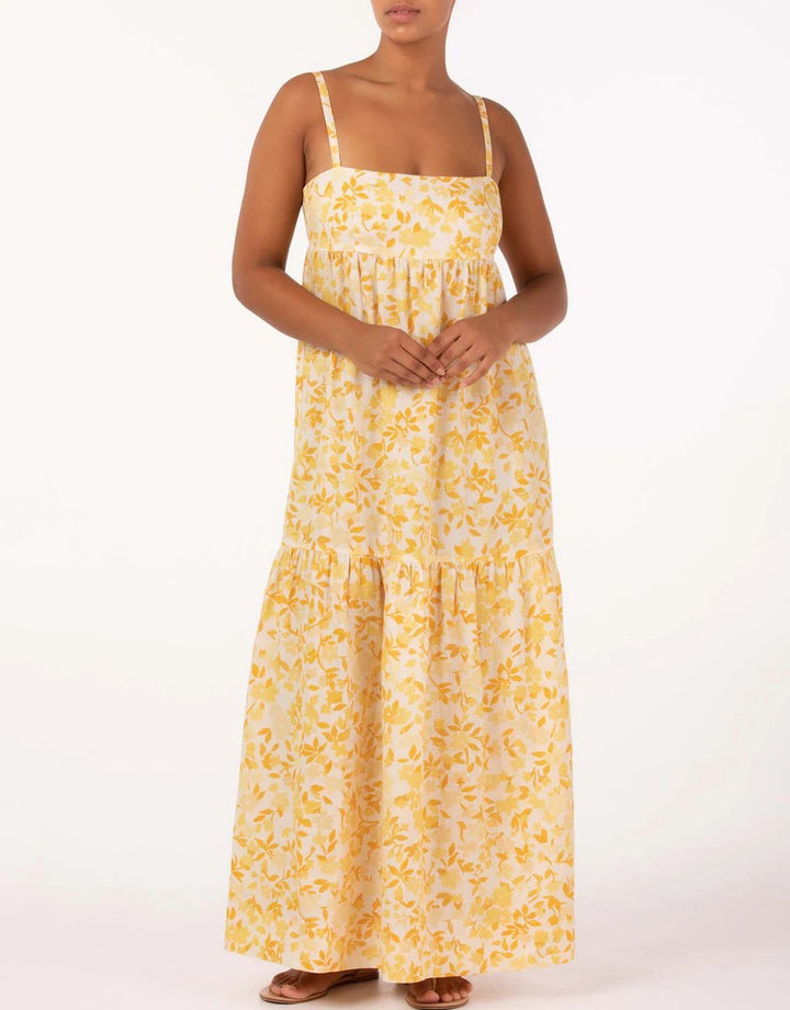 Effortless maxi dress with contoured bodice, open back, adjustable ties, and relaxed skirt in Peony's Daffodil floral print.