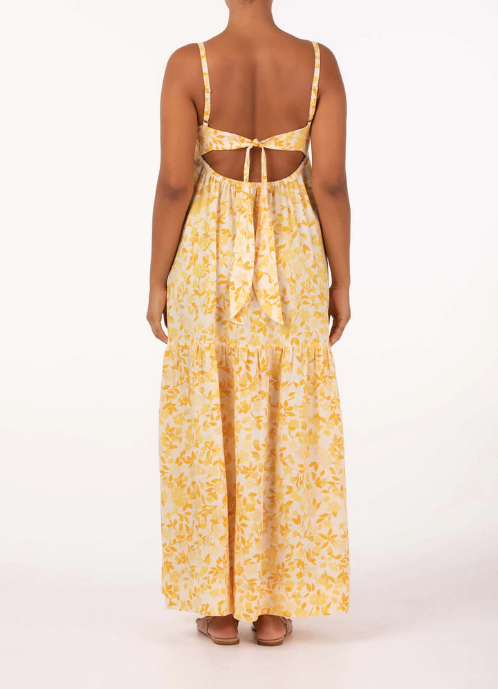 Effortless maxi dress with contoured bodice, open back, adjustable ties, and relaxed skirt in Peony's Daffodil floral print.