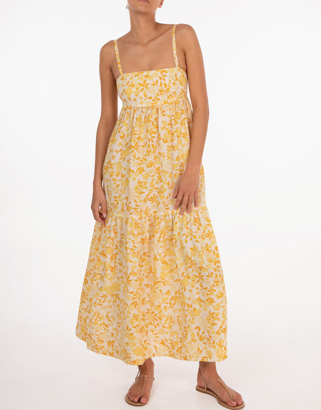 Effortless maxi dress with contoured bodice, open back, adjustable ties, and relaxed skirt in Peony's Daffodil floral print.