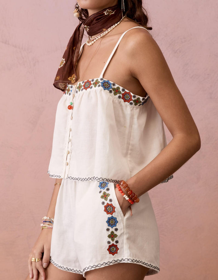 BOTEH Castela Embroidered Short tile-border embroidery detail in cerulean, terracotta and olive