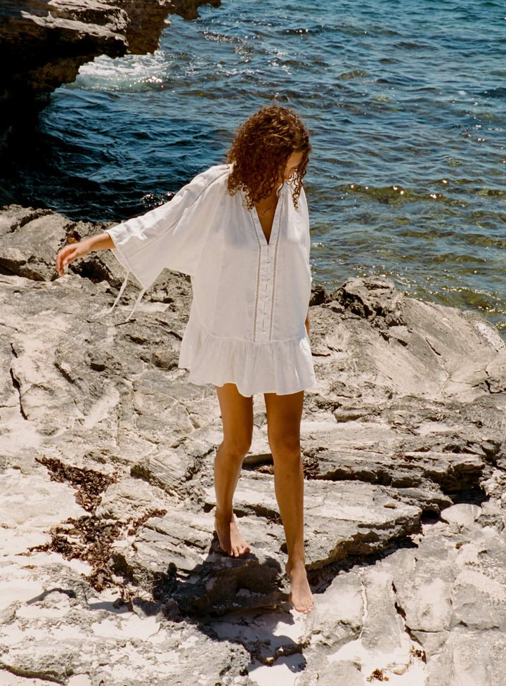 BOTEH La Ponche Frill Mini Dress in white cotton linen with ruffled hem