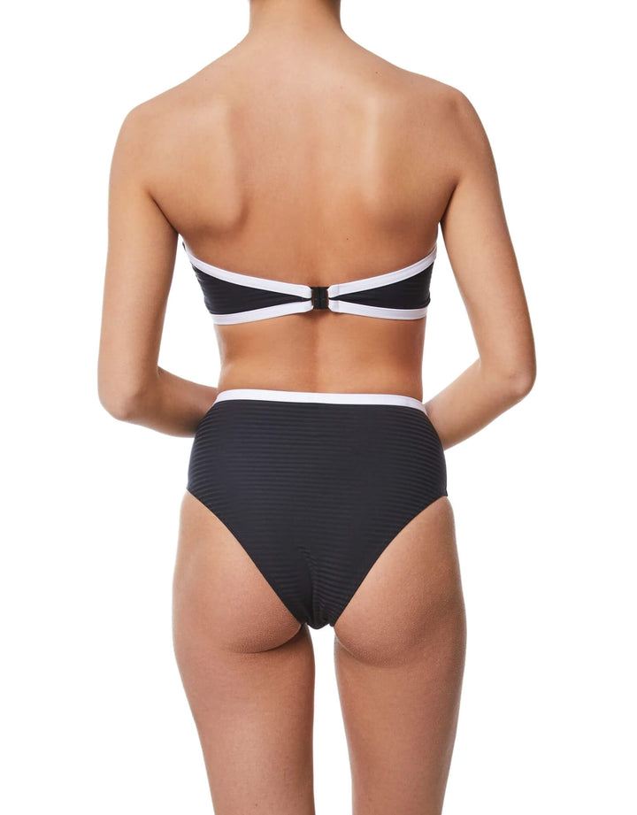 Kiohne JUNE bandeau bikini top with CORA high-waist bikini bottoms in black with white contrast binding, back view