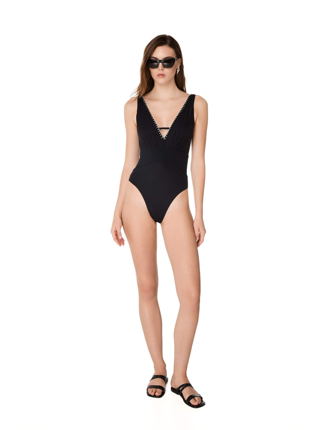 Kiohne Selene black one-piece with deep V neckline and contrast hand stitching