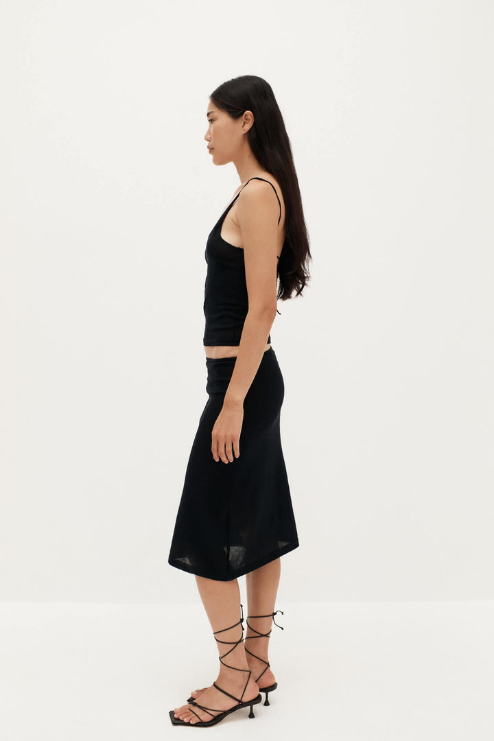 Side View of Ziah Sheer Knit Low-Rise Skirt in Black - Sheer Design with Organic Cotton