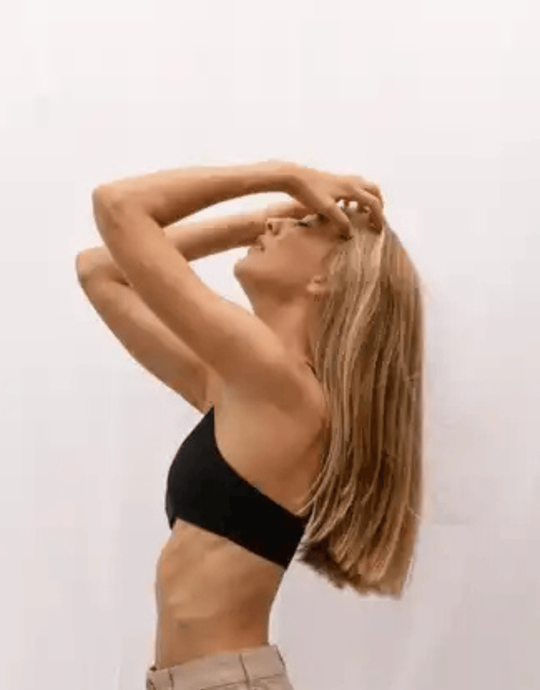 Essentials for Zula Franca Bralette Black — relaxed back pose outdoors
