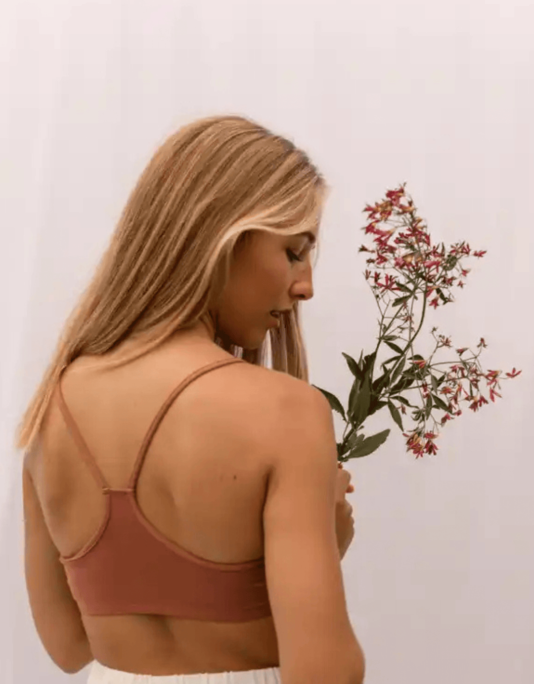Essentials for Zula Franca Bralette copper — lifestyle three-quarter back view