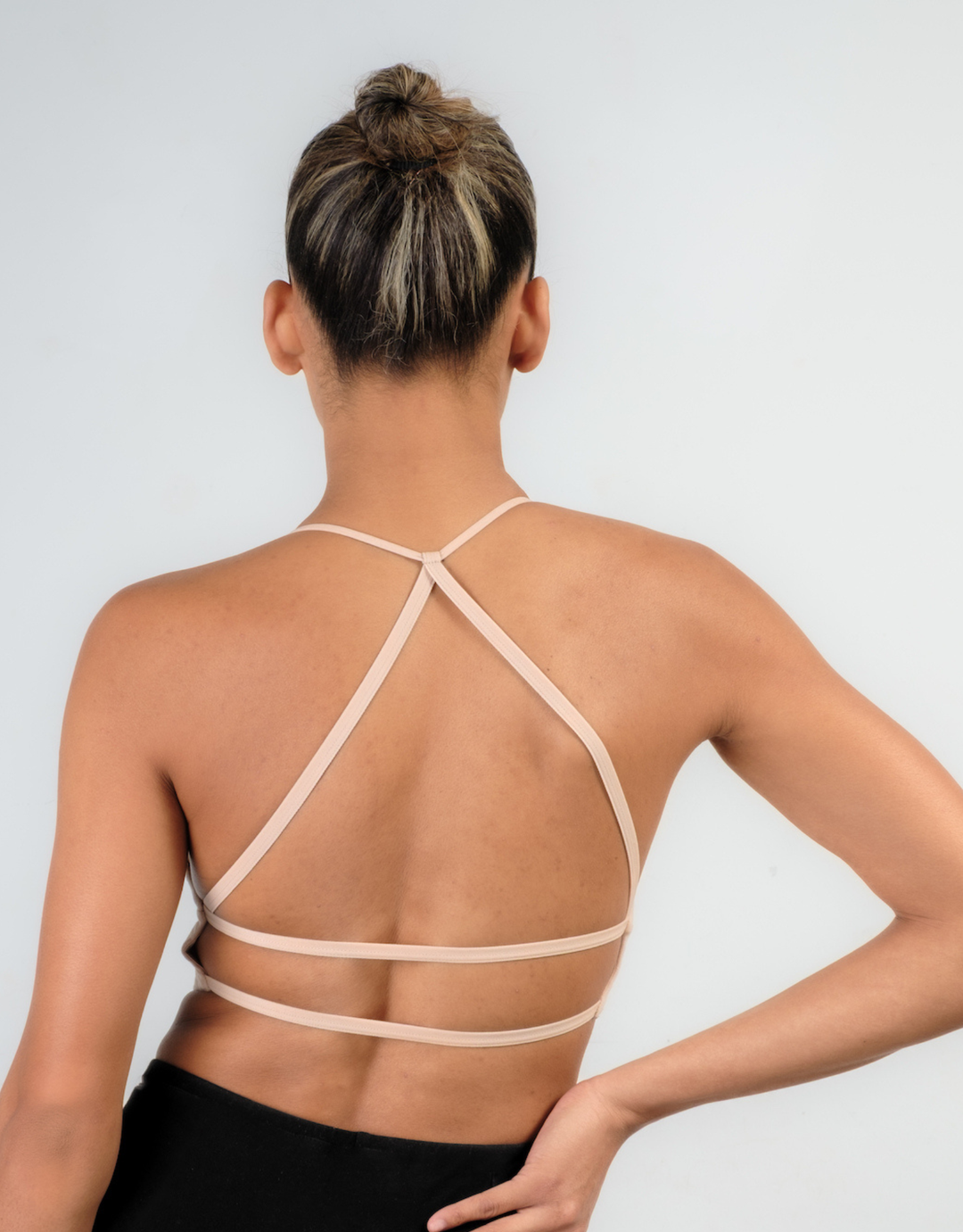 Essentials for Zula Octavia Bralette Ecru — back view on model highlighting open back straps