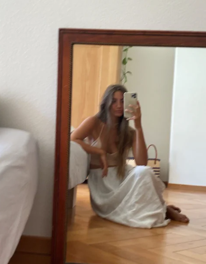 Essentials for Zula Octavia Bralette Ecru — seated mirror lifestyle shot