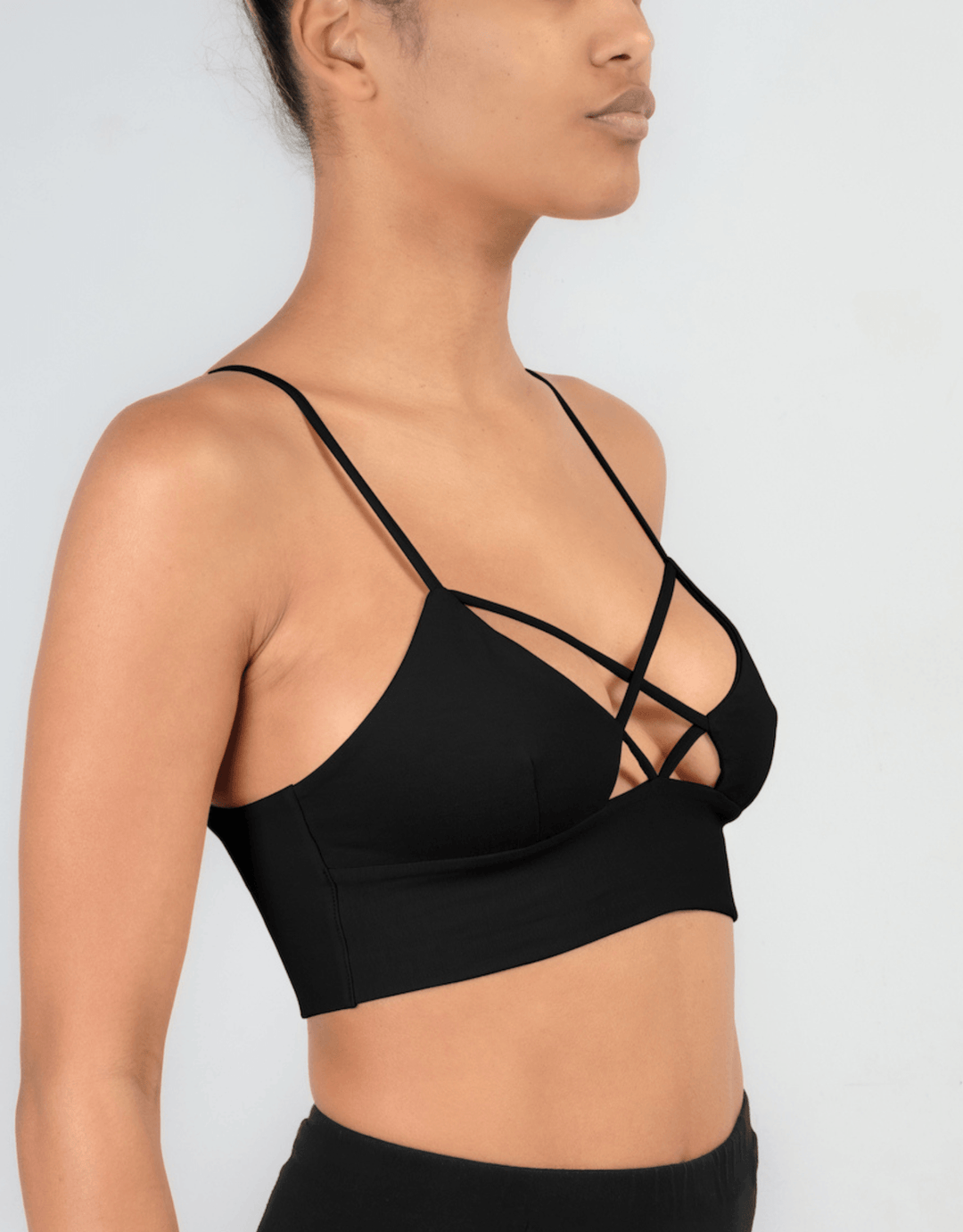 Essentials for Zula Olympia Bralette Black — side profile on model