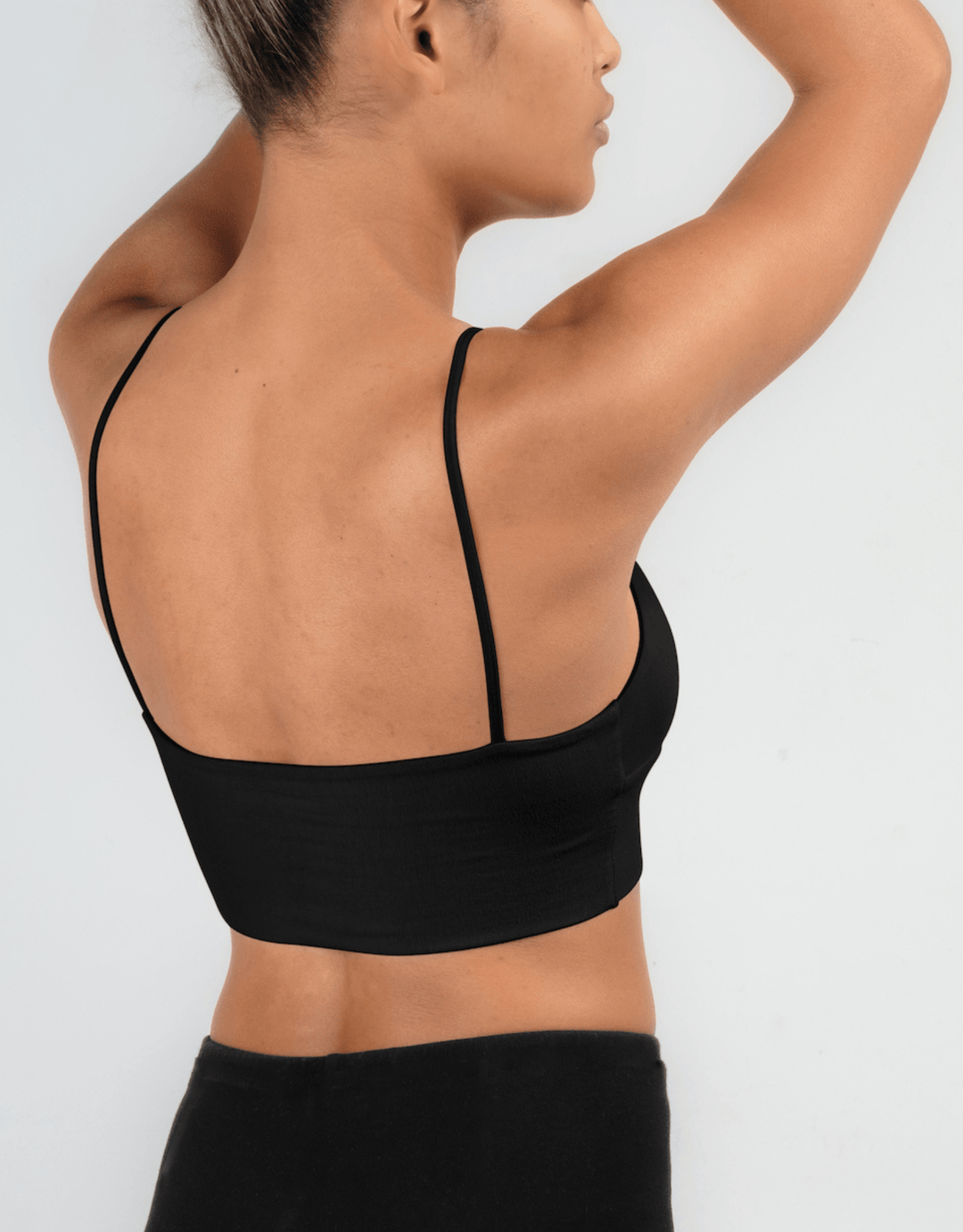 Essentials for Zula Olympia Bralette Black — back pose highlighting elastic band