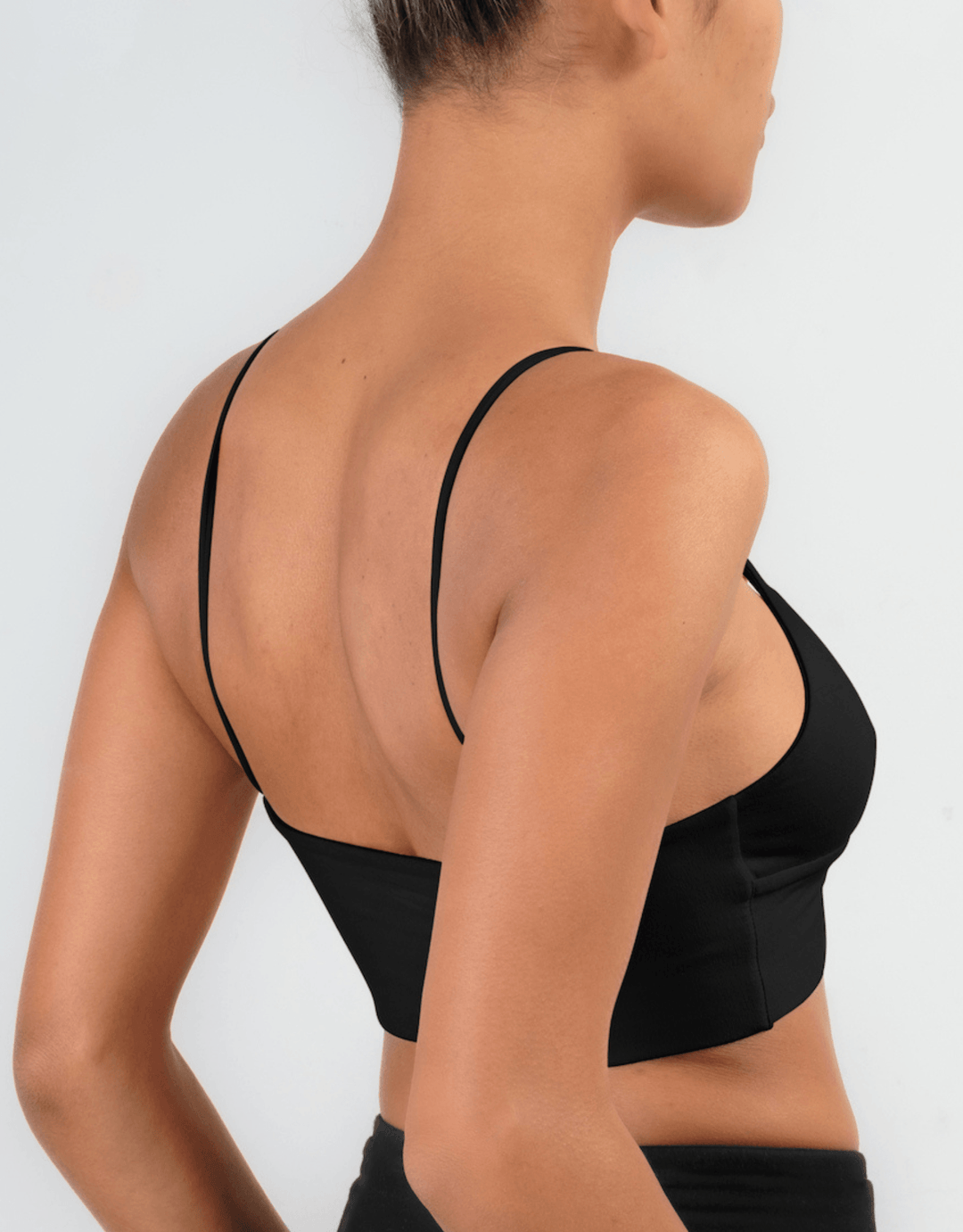 Essentials for Zula Olympia Bralette Black — three-quarter back lifestyle view
