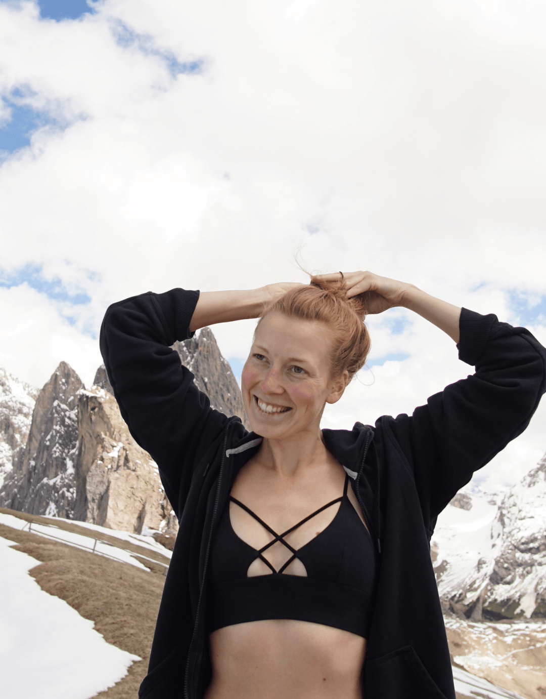 Essentials for Zula Olympia Bralette Black — outdoor lifestyle pose in snowy setting