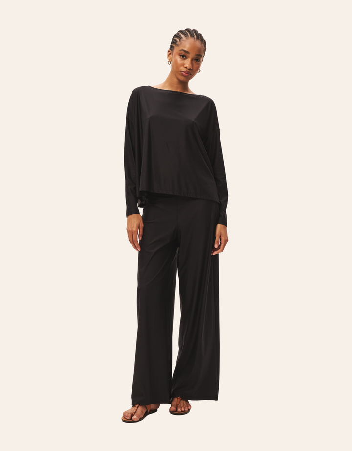 Lenny Niemeyer Relax Pants black styled with matching top — three-quarter front view