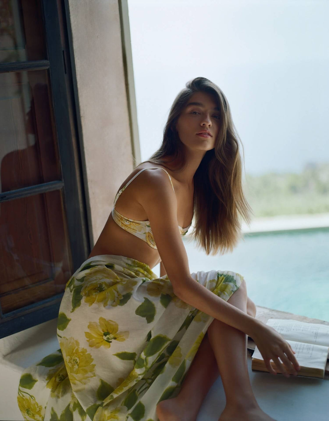 Peony Clair De Lune sarong in yellow floral print draped around the body