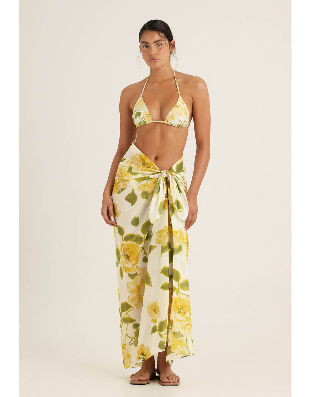 Peony Clair De Lune sarong in yellow floral print draped around the body