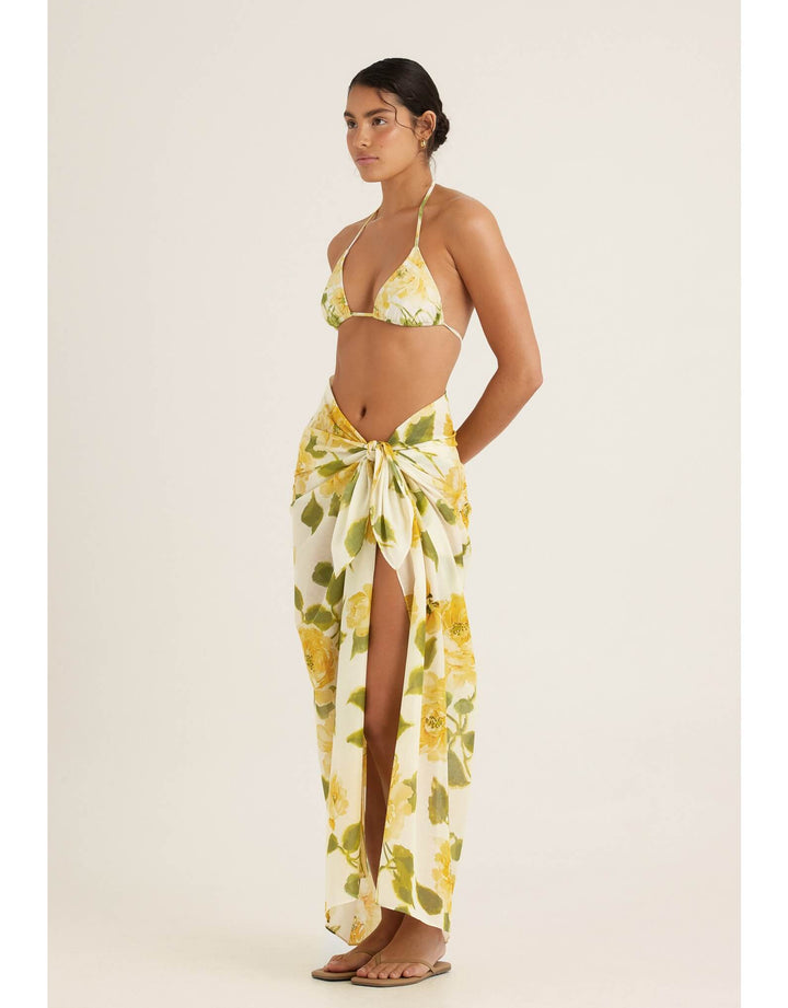 Peony Clair De Lune sarong in yellow floral print draped around the body