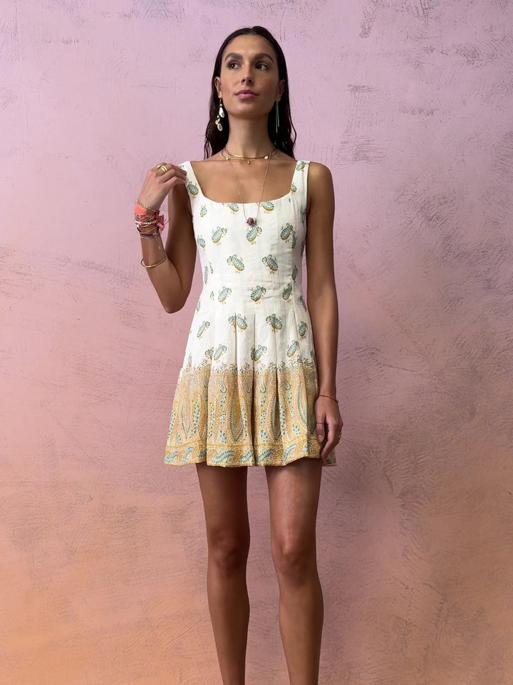 BOTEH Jardin Bodice Mini Dress in cream linen with boned bodice, shirring panel, and pleated hem