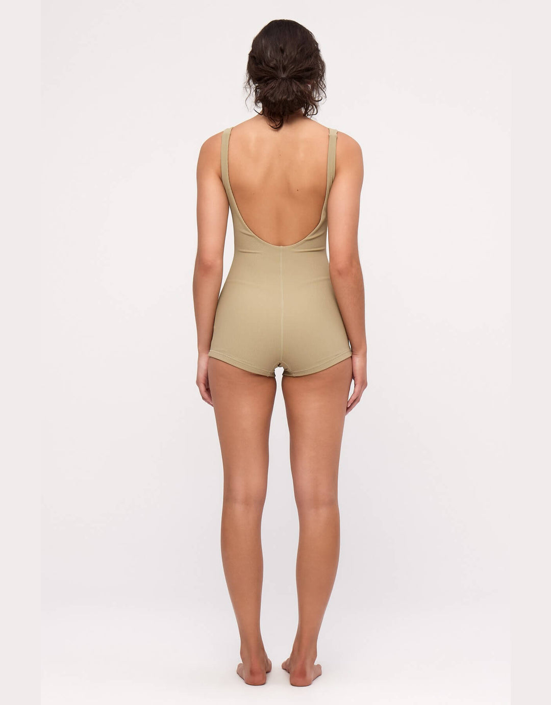 Model wearing Zulu and Zephyr Stripe Rib Bodysuit in Olive